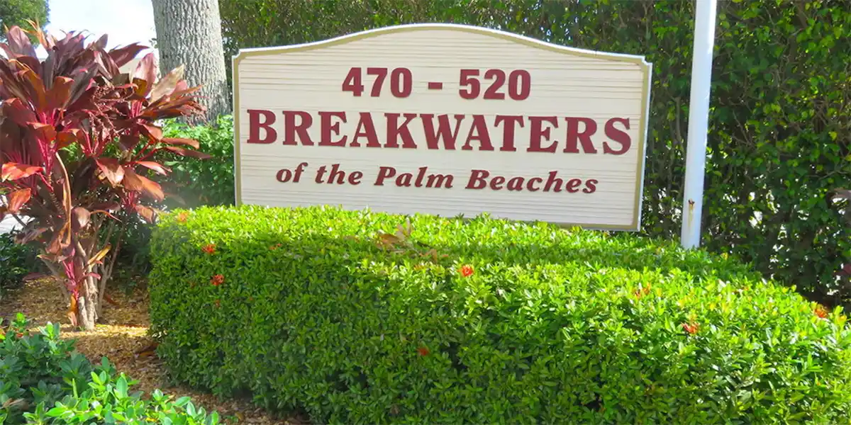 470 Executive Center Dr 4N West Palm Beach FL 33401-2979 Neighborhood Sign Red on white Greenery