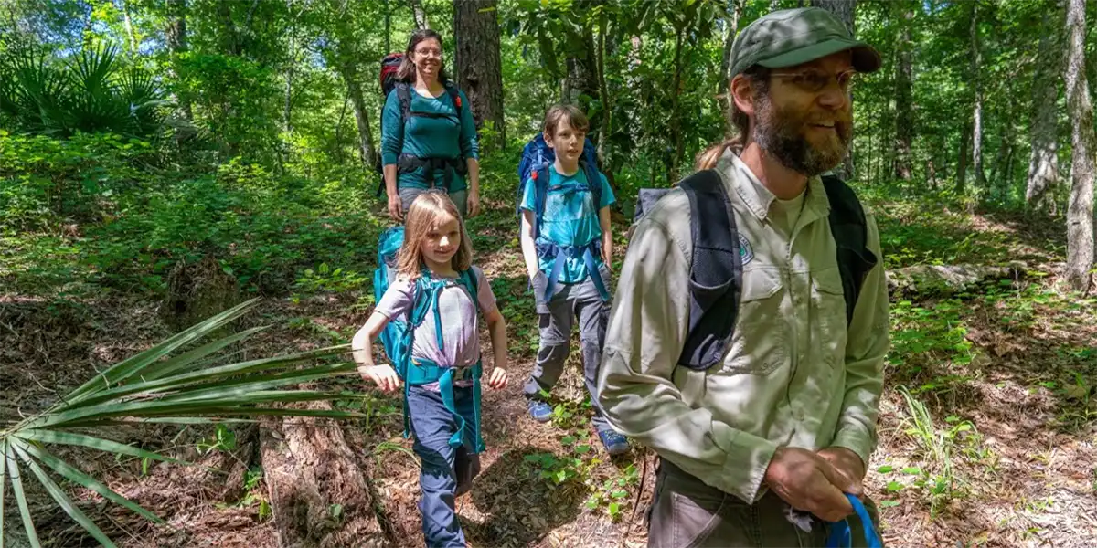 Father's Day Father Son Daughter Mother Hiking in Woods Vacation Fun 